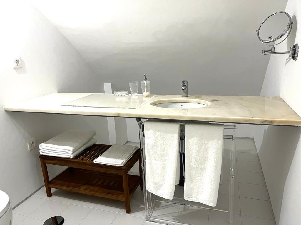 Signature Guesthouse Porto Quarto foto
